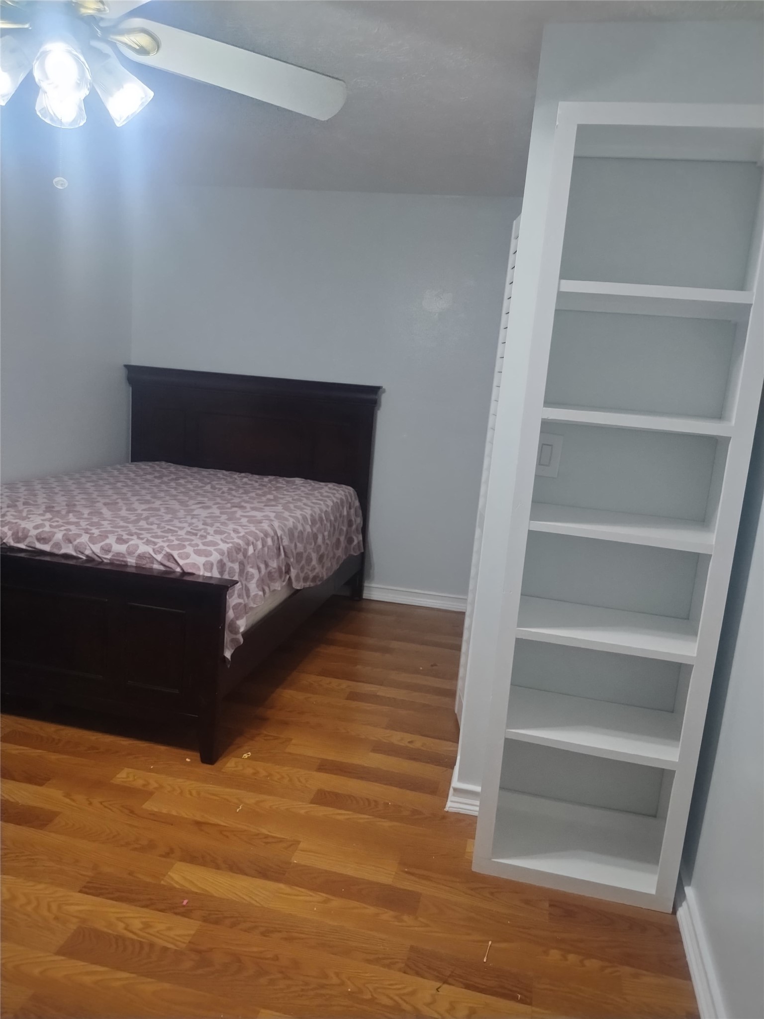 507 Firnat Street Houston, TX 77022 - Photo 20 of 22 a bedroom with a bed and a window