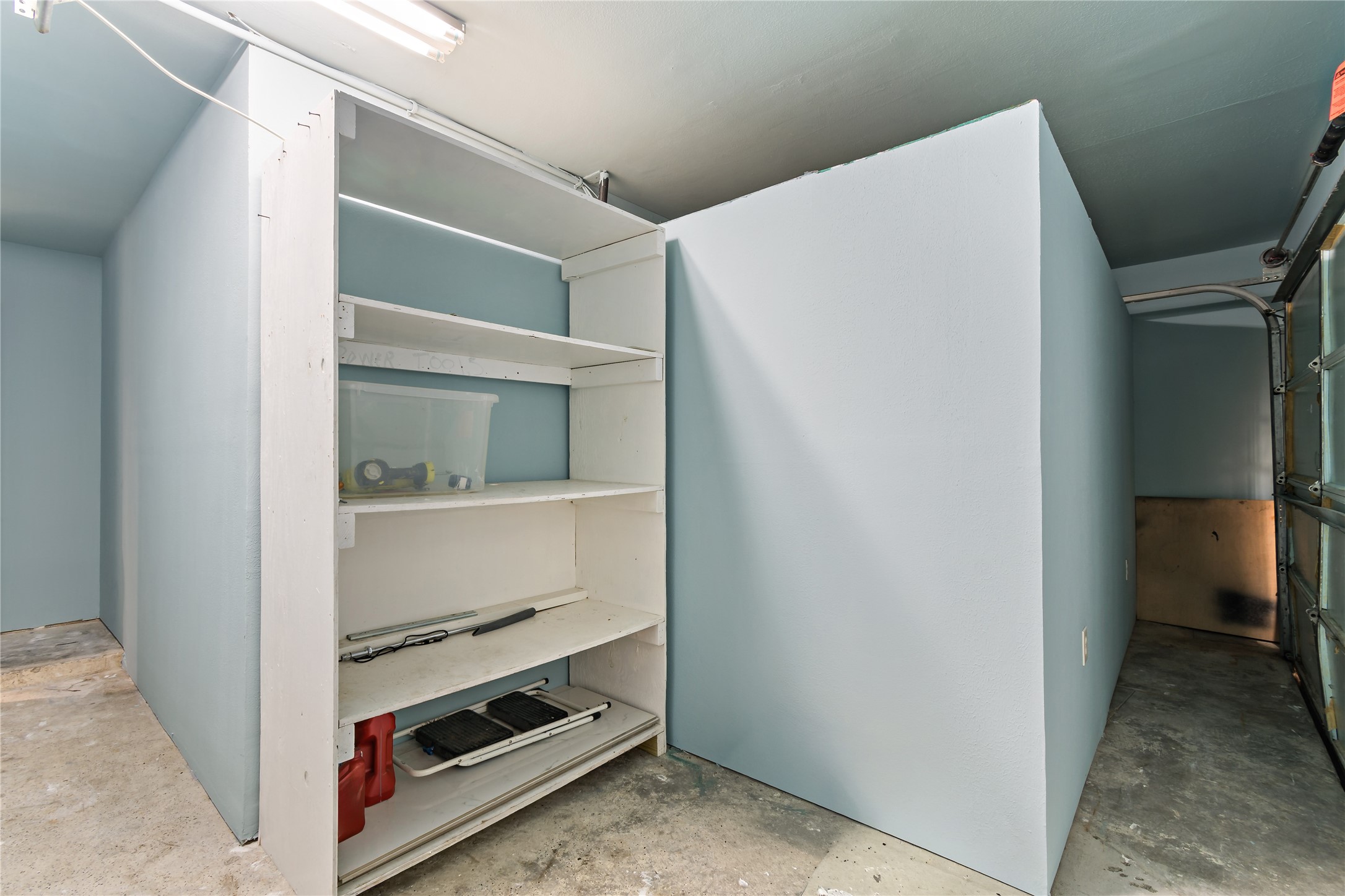 507 Firnat Street Houston, TX 77022 - Photo 9 of 22 a room with storage and utility