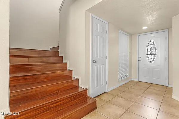 a view of entryway with wooden floor