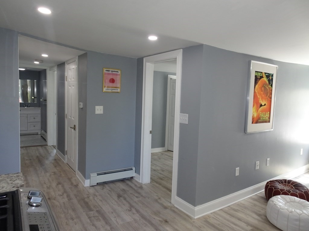 416 Crescent Avenue Chelsea, MA 02150 - Photo 11 of 21 a view of livingroom with furniture and wooden floor