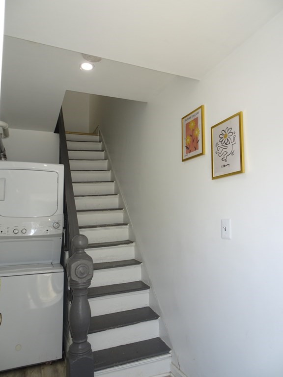 416 Crescent Avenue Chelsea, MA 02150 - Photo 16 of 21 a view of entryway with stairs and wooden floor