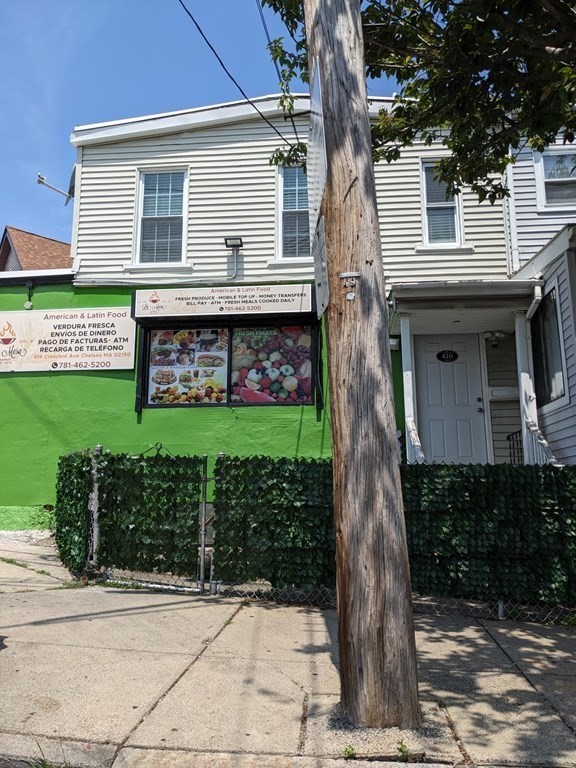 416 Crescent Avenue Chelsea, MA 02150 - Photo 3 of 21 a front view of a house with garden