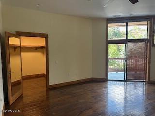 295 Main Street, Unit R204 Edwards, CO 81632 - Photo 5 of 9 an empty room with wooden floor and windows