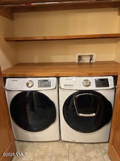 295 Main Street, Unit R204 Edwards, CO 81632 - Photo 8 of 9 a utility room with dryer and washer
