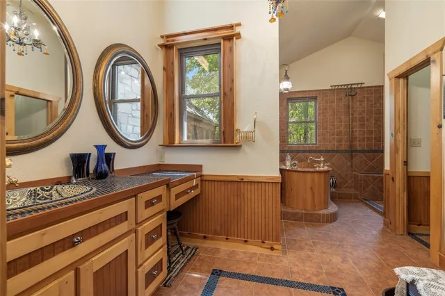 a view of a kitchen with stove and window