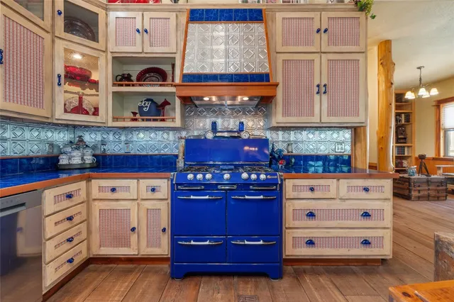 a kitchen with stainless steel appliances cabinets and a counter top