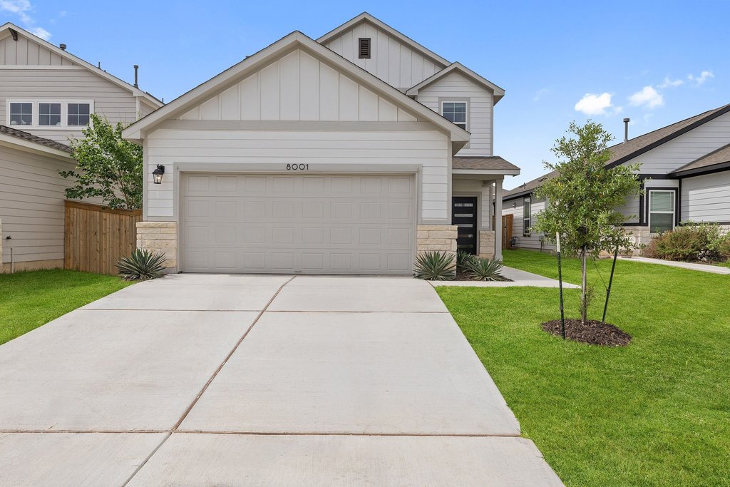8001 Andravida Drive Austin, TX 78747 - Photo 2 of 35 Picture-perfect curb appeal with a clean, modern exterior and inviting front entry