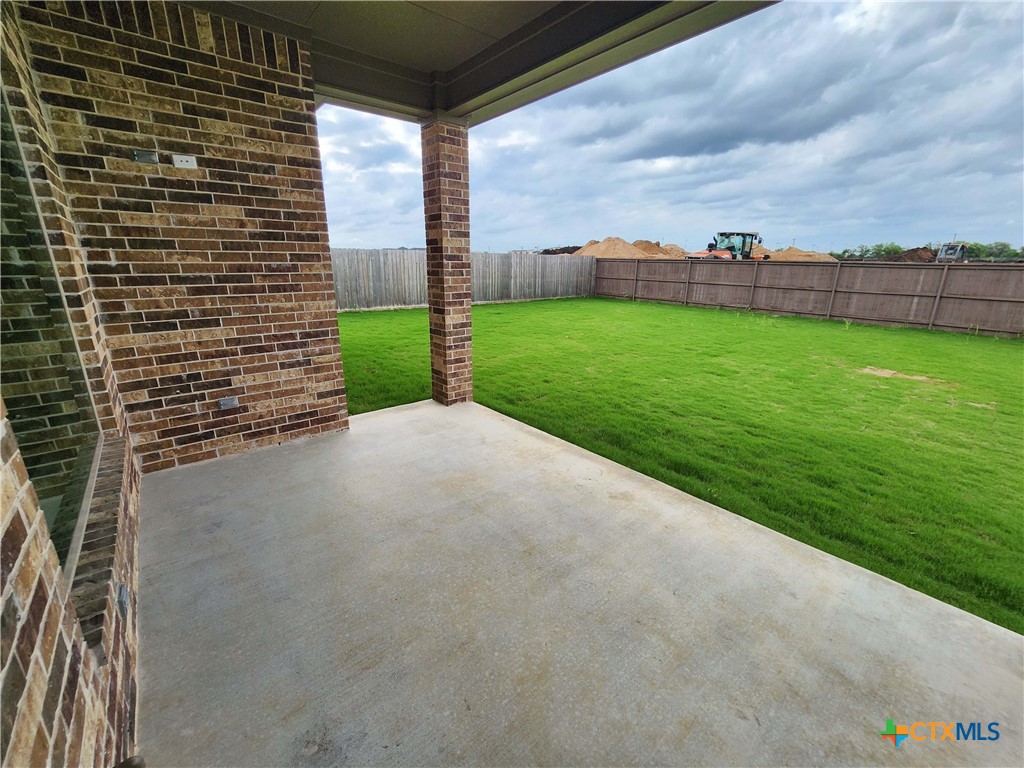 406 Talon Loop Salado, TX 76571 - Photo 30 of 31 a view of a garden with tall buildings
