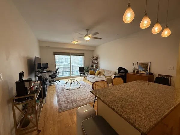 a very nice looking dining room with furniture
