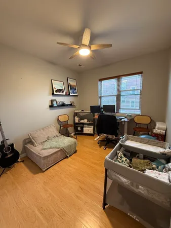 a room with furniture and a window