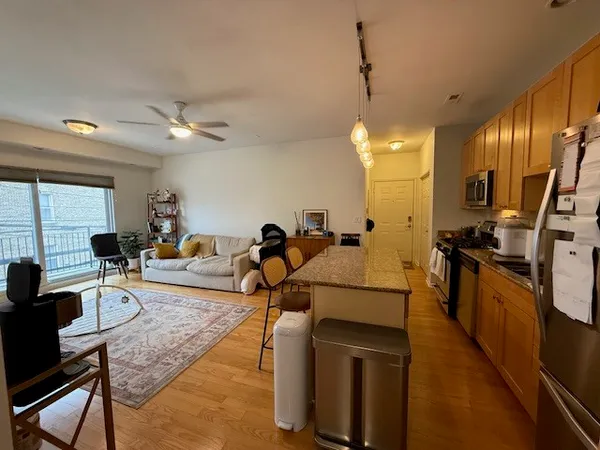 a view of a living room and dining room