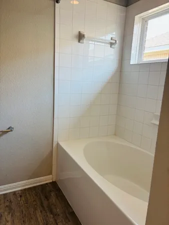 a bathroom with a sink vanity and a mirror
