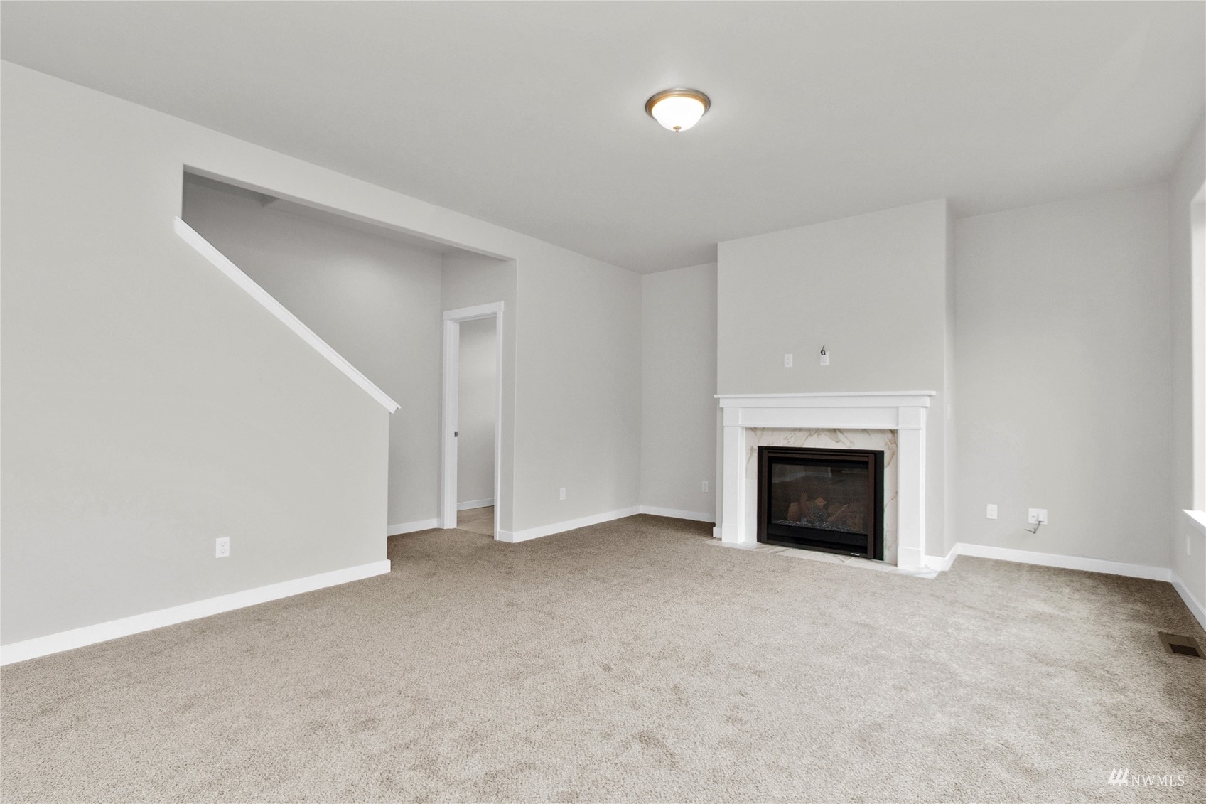 9727 9th Avenue Southeast Lacey, WA 98513 - Photo 13 of 38 a view of empty room with a fireplace