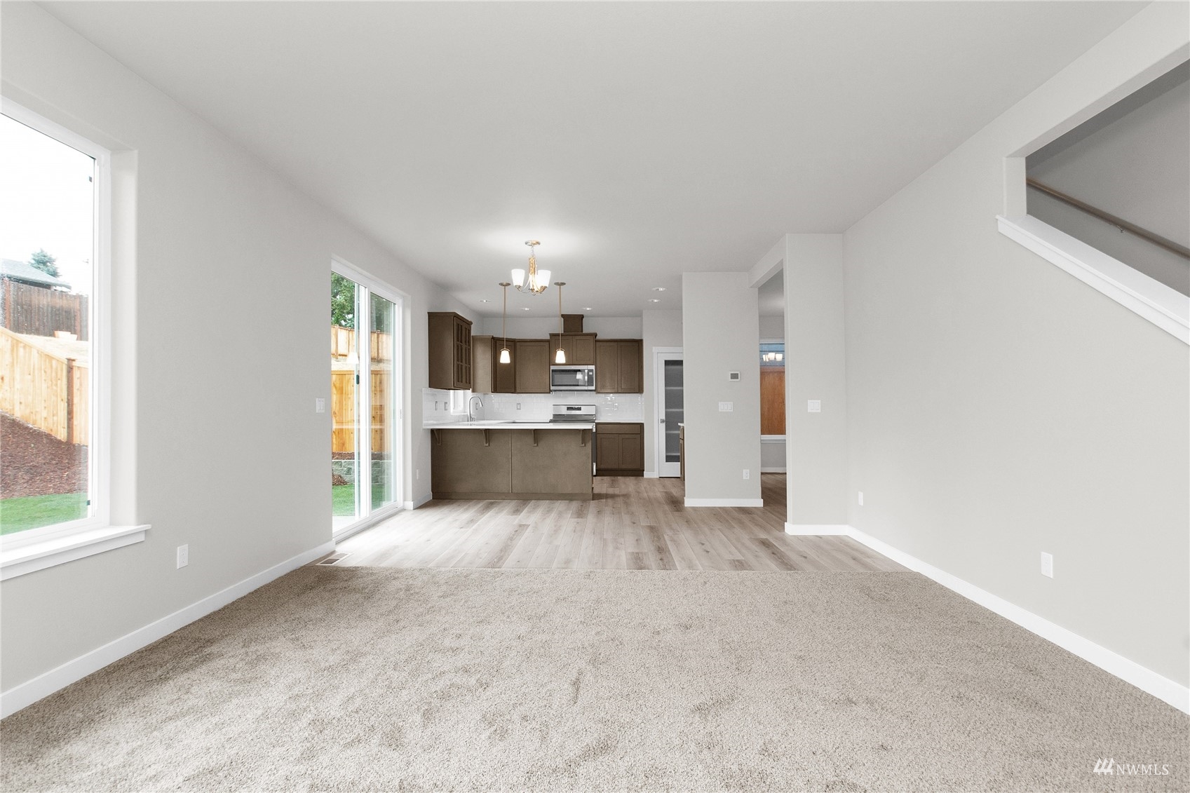 9727 9th Avenue Southeast Lacey, WA 98513 - Photo 15 of 38 a view of a kitchen with a sink cabinets and a window