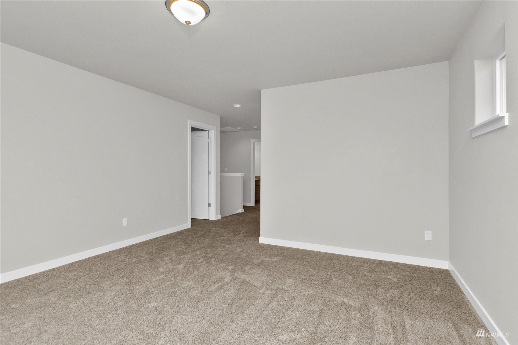 9727 9th Avenue Southeast Lacey, WA 98513 - Photo 18 of 38 a view of an empty room