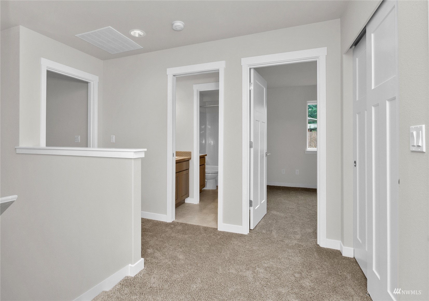 9727 9th Avenue Southeast Lacey, WA 98513 - Photo 20 of 38 an empty room with closet and a bathroom