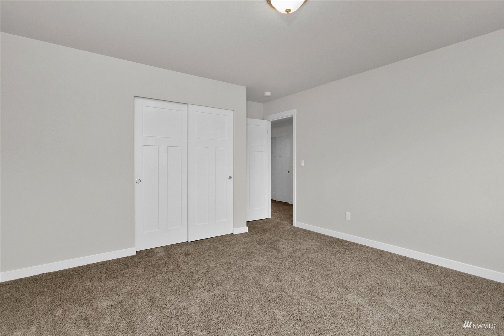 9727 9th Avenue Southeast Lacey, WA 98513 - Photo 22 of 38 a view of an empty room