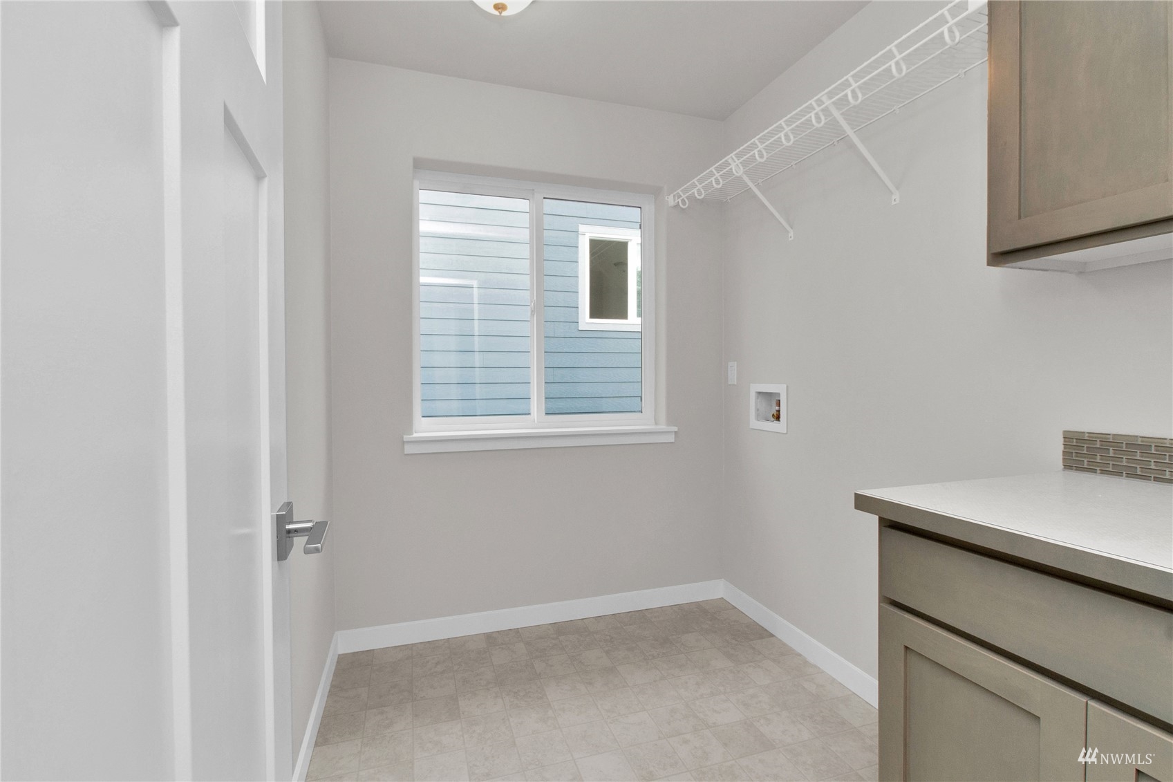 9727 9th Avenue Southeast Lacey, WA 98513 - Photo 24 of 38 a view of an empty room with a window