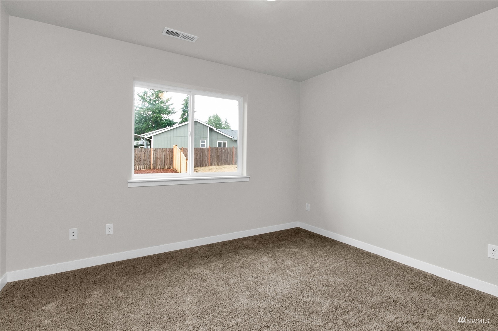9727 9th Avenue Southeast Lacey, WA 98513 - Photo 25 of 38 an empty room with a window