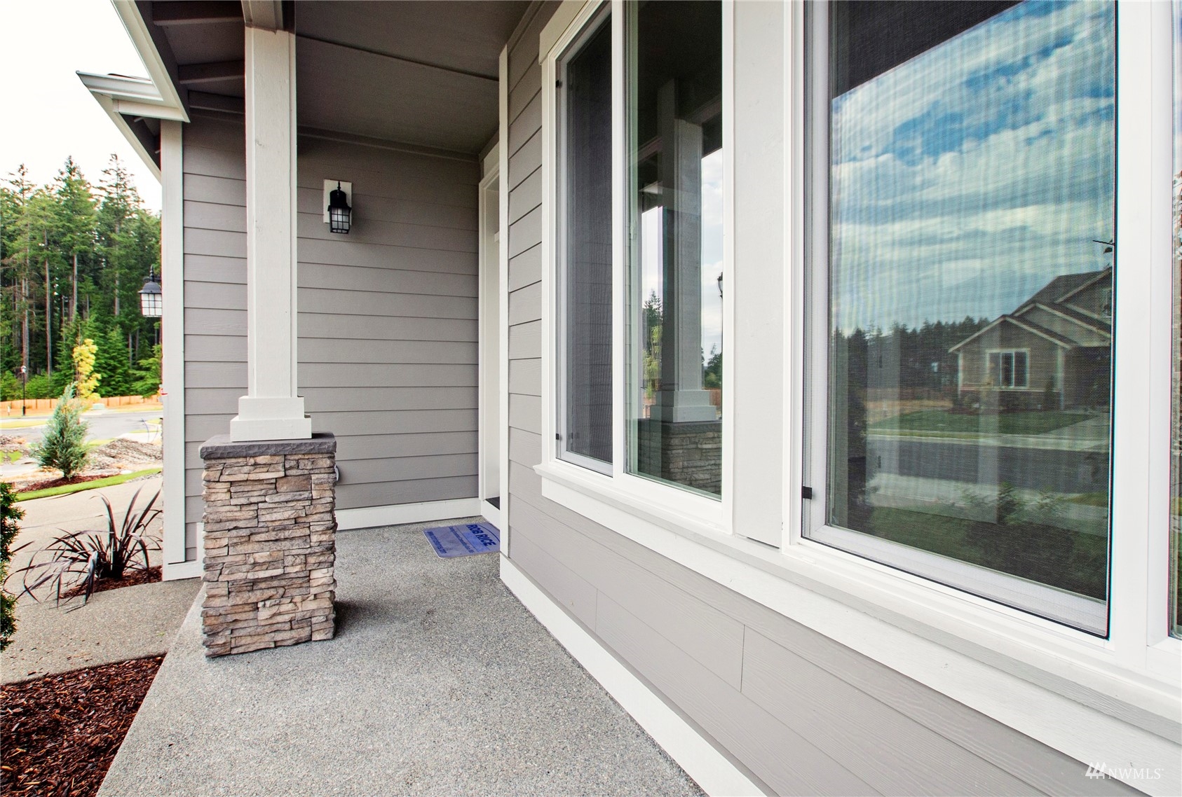 9727 9th Avenue Southeast Lacey, WA 98513 - Photo 3 of 38 a view of a door and a window