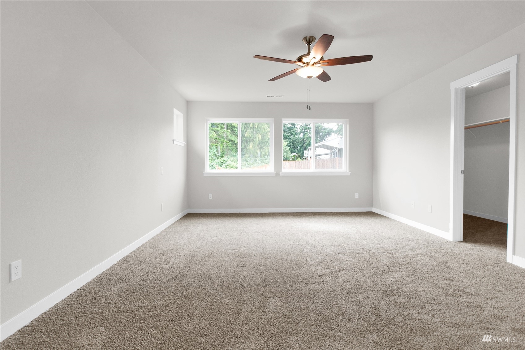 9727 9th Avenue Southeast Lacey, WA 98513 - Photo 32 of 38 a view of an empty room with a window