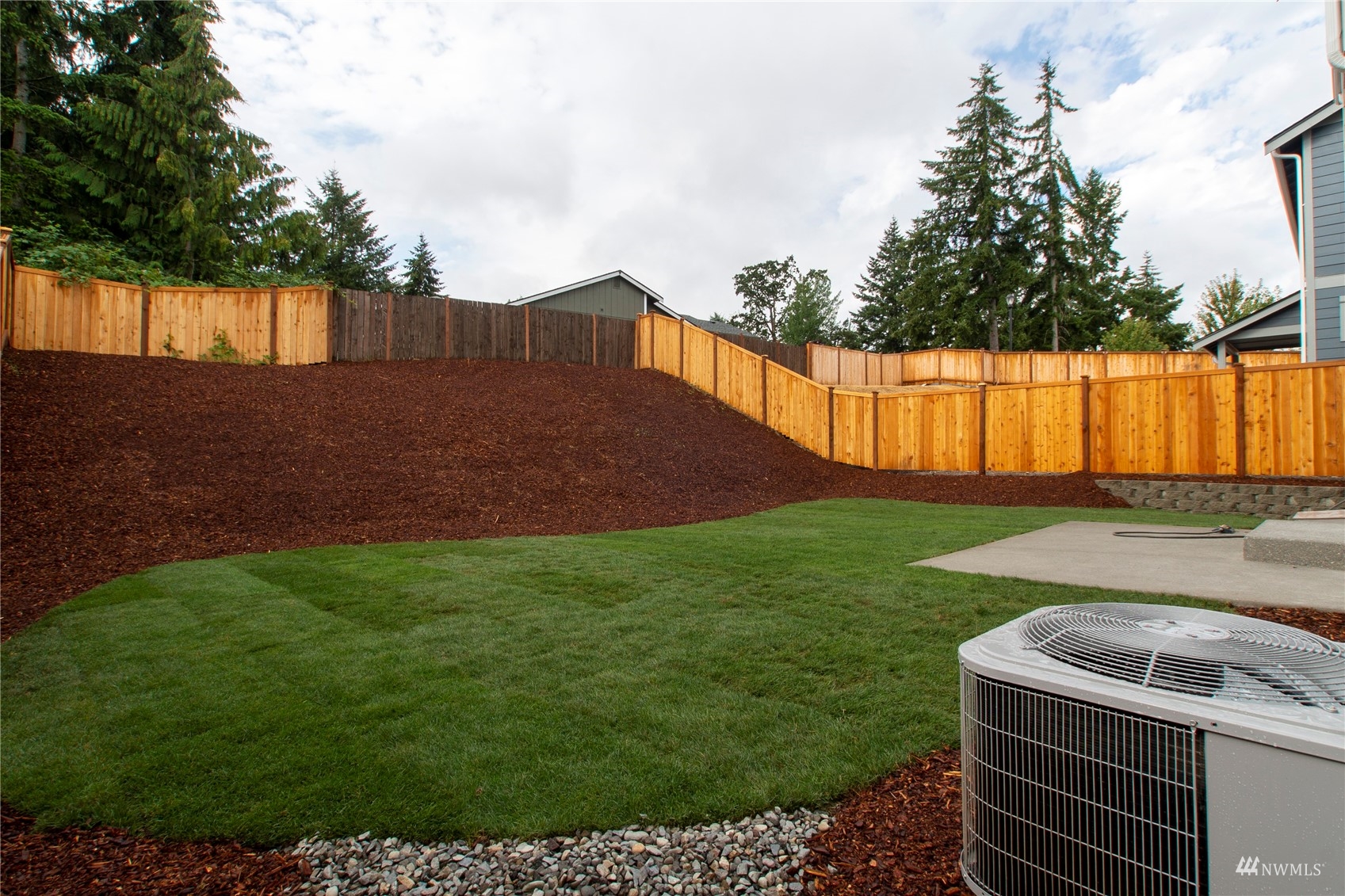 9727 9th Avenue Southeast Lacey, WA 98513 - Photo 36 of 38 a view of a backyard with a small cabin