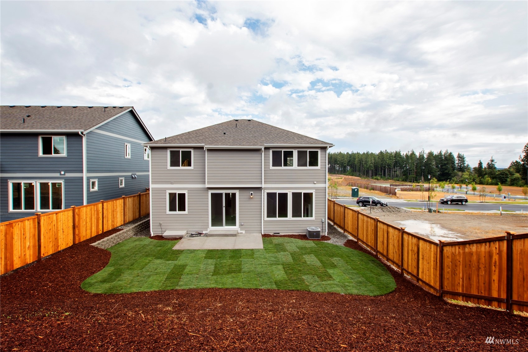 9727 9th Avenue Southeast Lacey, WA 98513 - Photo 38 of 38 a front view of a house with swimming pool and porch