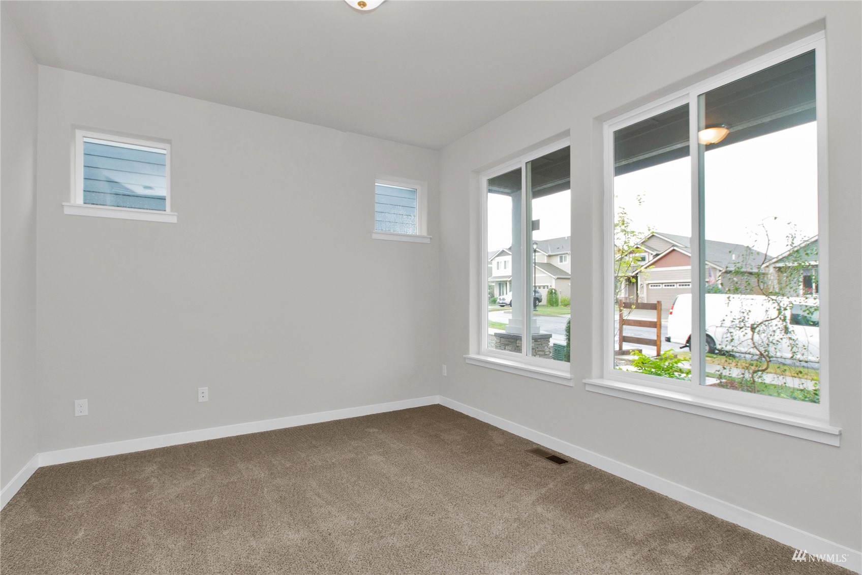 9727 9th Avenue Southeast Lacey, WA 98513 - Photo 6 of 38 a view of an empty room with a window