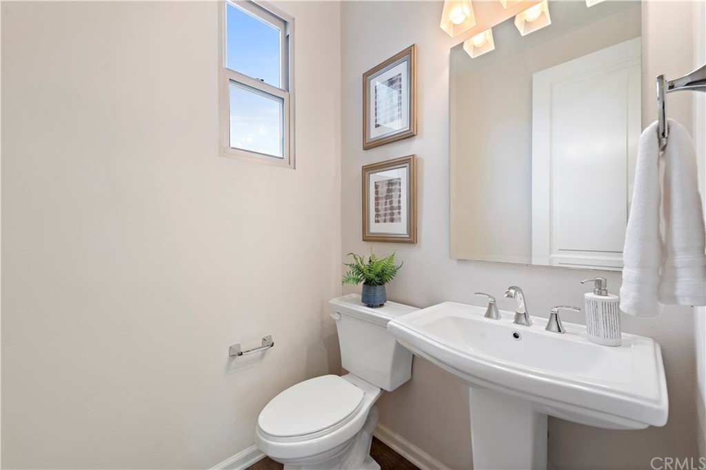 113 Painted Trellis Irvine, CA 92620 - Photo 11 of 26 a bathroom with a sink mirror and toilet