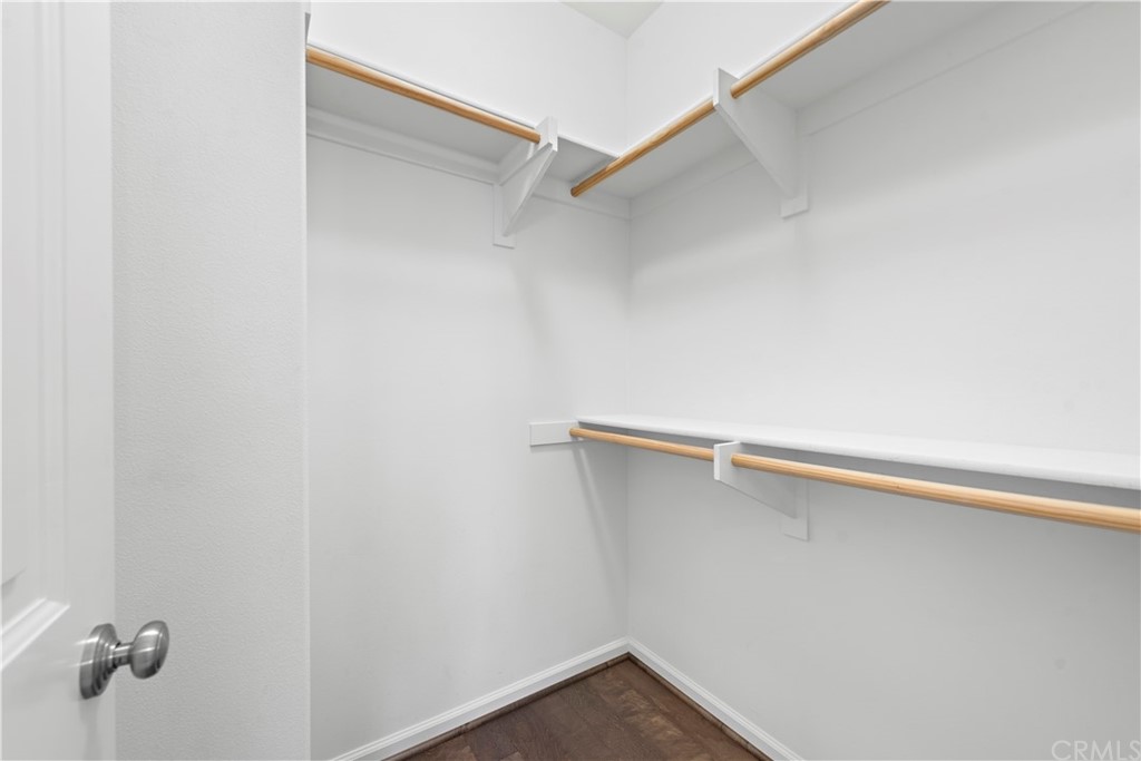 113 Painted Trellis Irvine, CA 92620 - Photo 17 of 26 a view of small space with racks on the wall