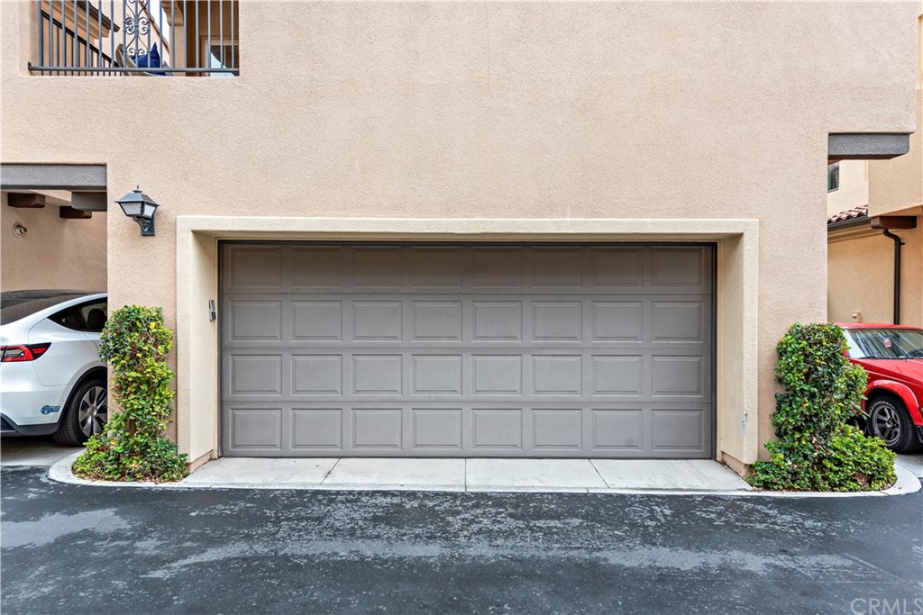 113 Painted Trellis Irvine, CA 92620 - Photo 21 of 26 a front view of a house with a yard