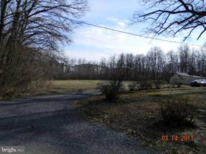 1179 Summerfield Road Gambrills, MD 21054 - Photo 2 of 7 a view of a yard