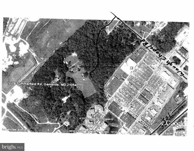 1179 Summerfield Road Gambrills, MD 21054 - Photo 7 of 7 a black and white photo of a house