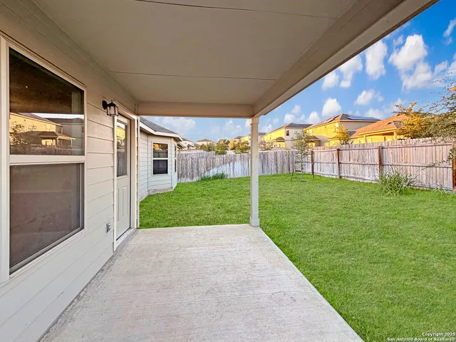 a view of a backyard with garden