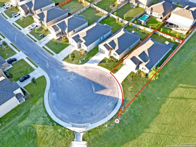 an aerial view of a backyard