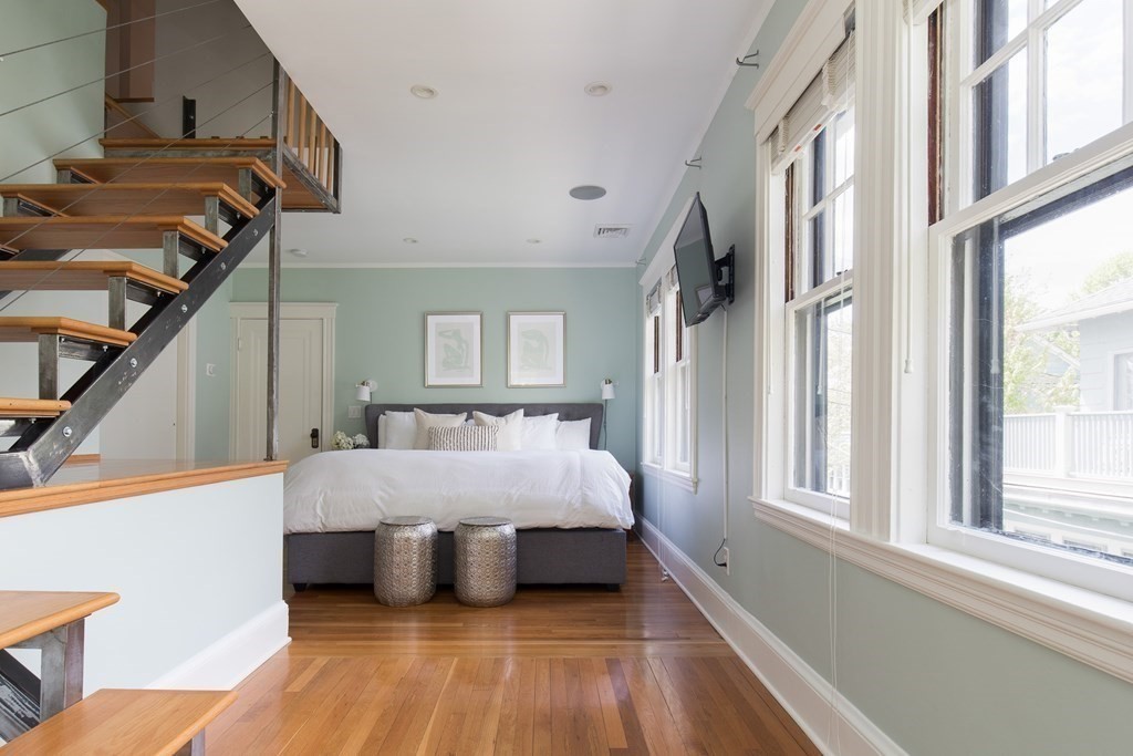 6-8 Longfellow Road Cambridge, MA 02138 - Photo 15 of 40 a bed room with a bed and a window