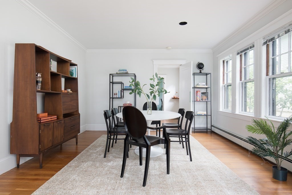 6-8 Longfellow Road Cambridge, MA 02138 - Photo 25 of 40 a view of a dining room with furniture window and wooden floor
