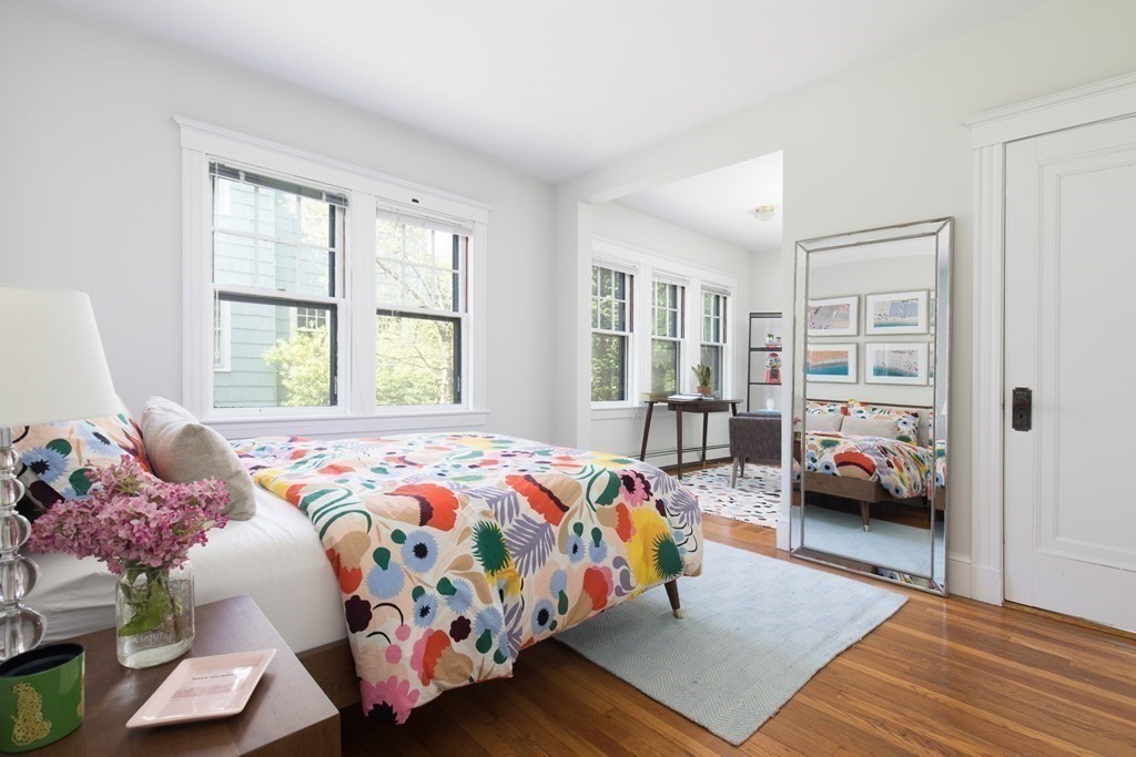 6-8 Longfellow Road Cambridge, MA 02138 - Photo 27 of 40 a bedroom with a bed and wooden floor