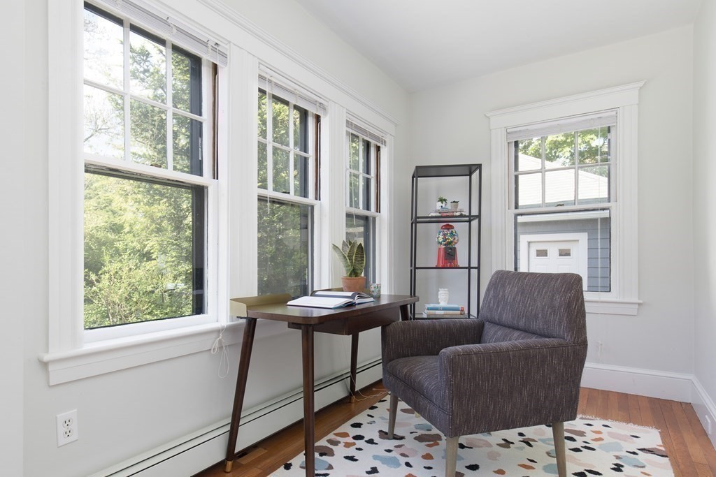 6-8 Longfellow Road Cambridge, MA 02138 - Photo 28 of 40 a living room with furniture and a window