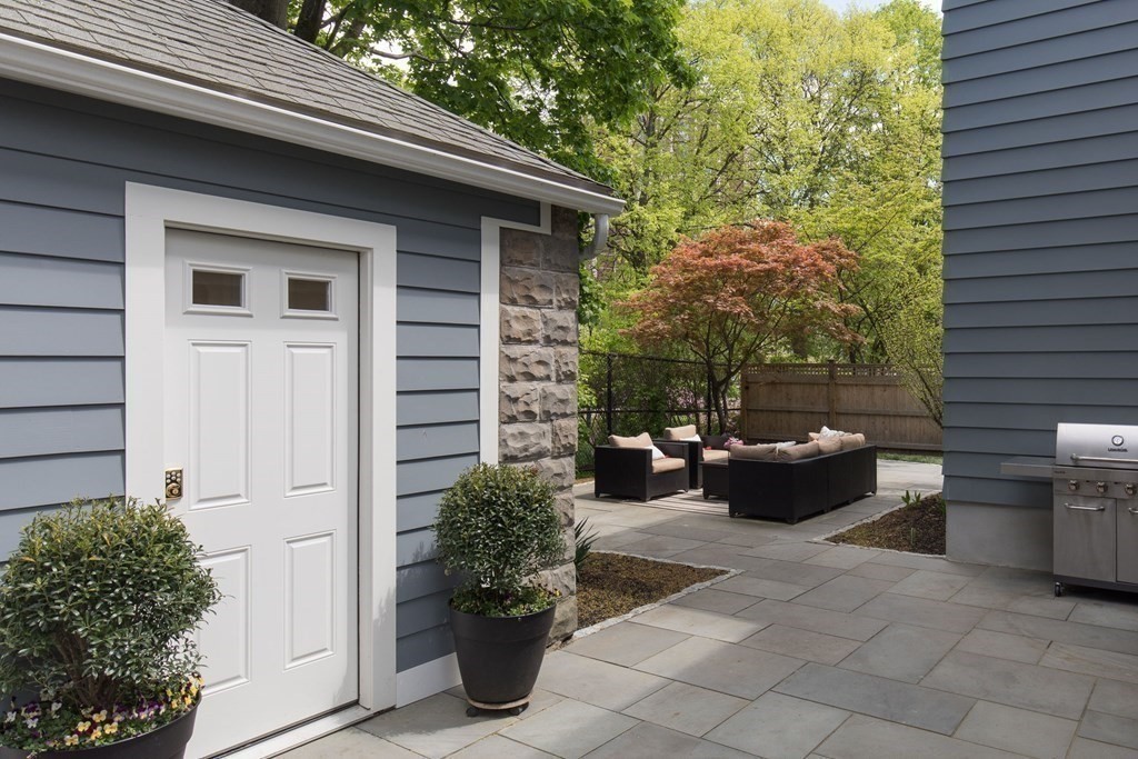 6-8 Longfellow Road Cambridge, MA 02138 - Photo 38 of 40 a view of a patio with couches and potted plants