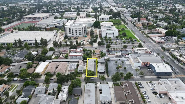 an aerial view of a city with lots of residential buildings