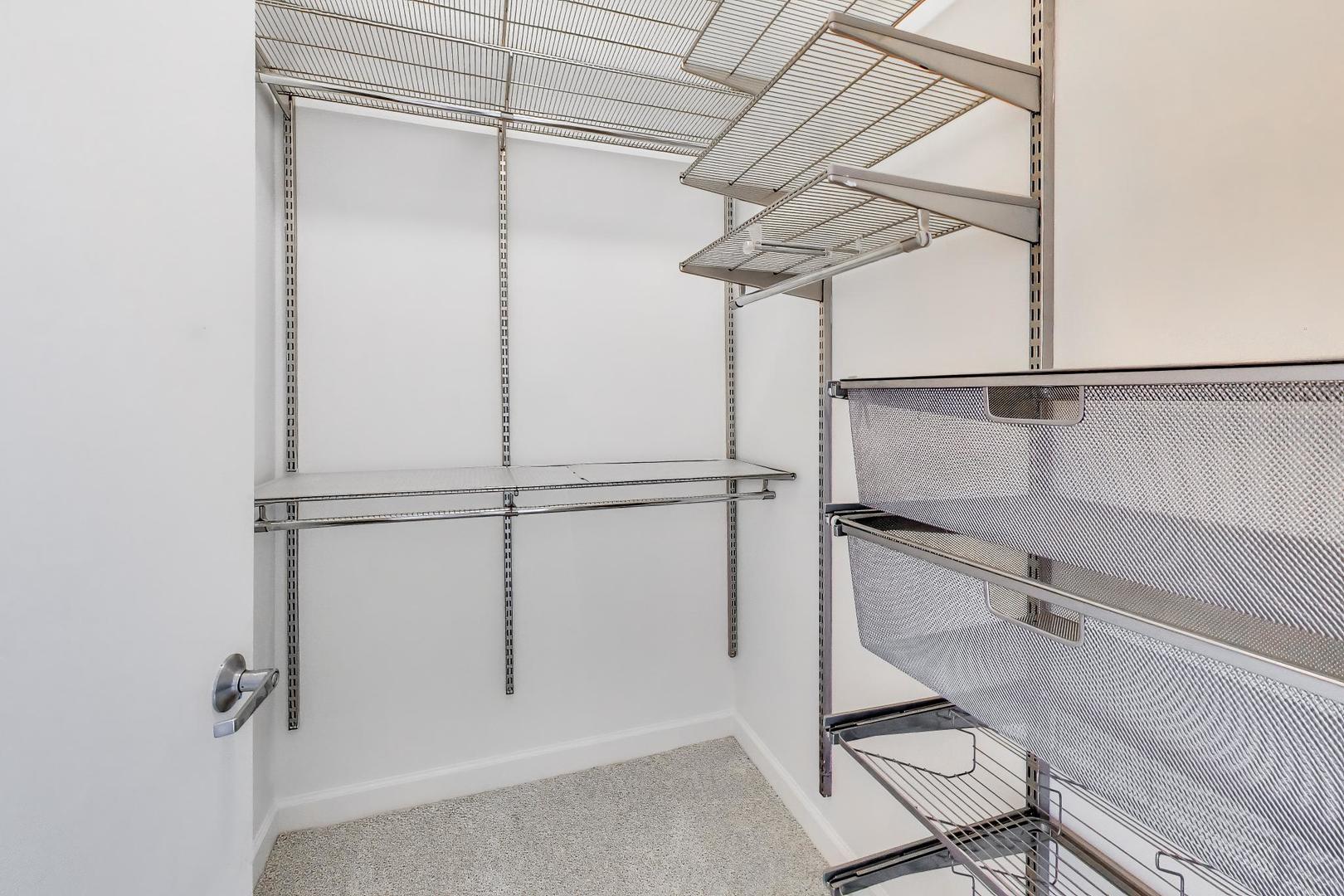 1629 South Prairie Avenue, Unit 1806 Chicago, IL 60616 - Photo 12 of 27 a view of a room with racks on the wall