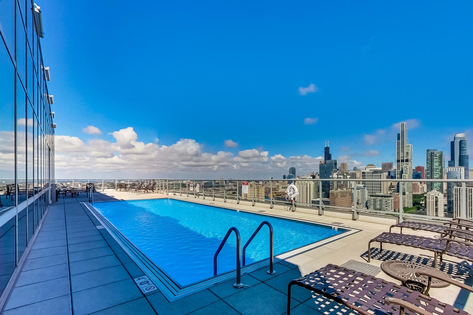 1629 South Prairie Avenue, Unit 1806 Chicago, IL 60616 - Photo 23 of 27 a view of a balcony with chairs