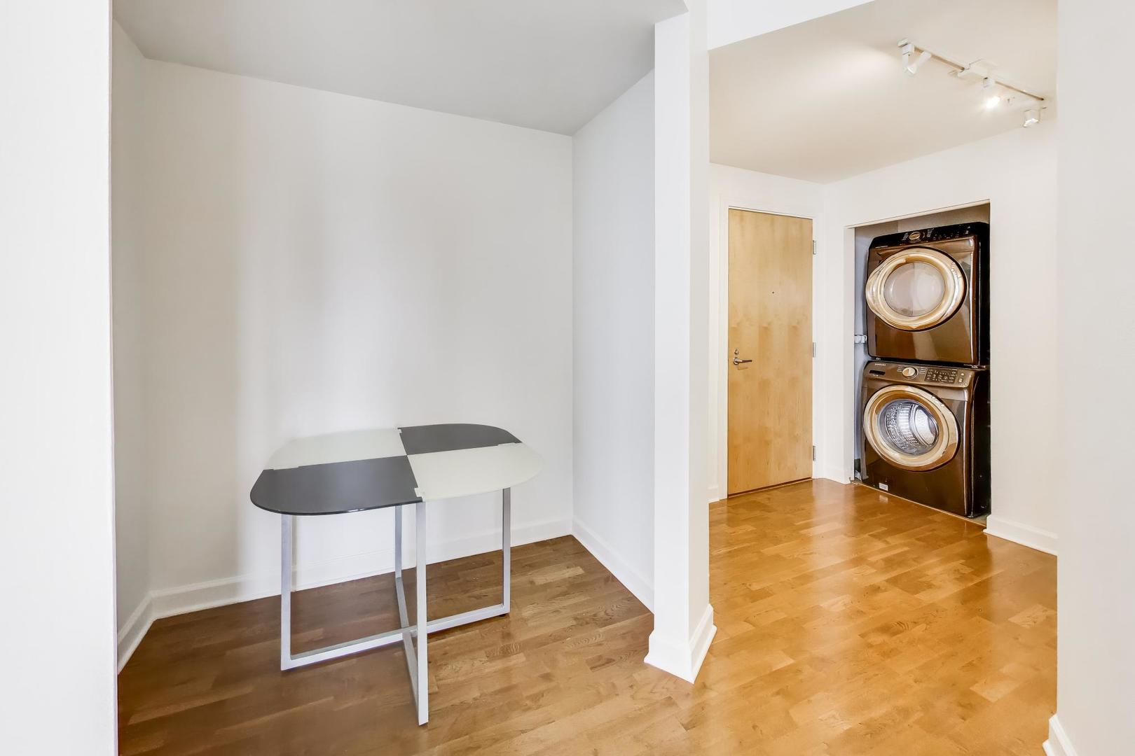 1629 South Prairie Avenue, Unit 1806 Chicago, IL 60616 - Photo 7 of 27 a view of livingroom with furniture and wooden floor