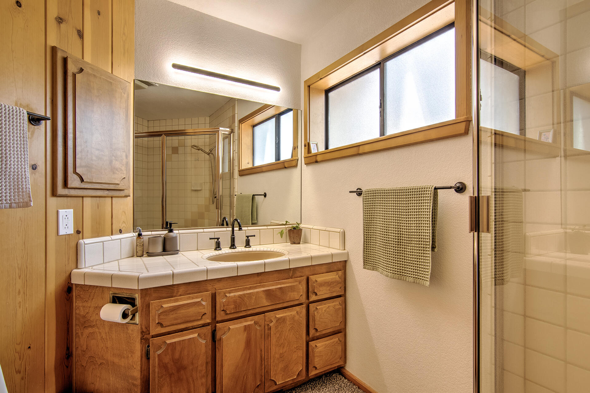 55540 Howland Road Idyllwild, CA 92549 - Photo 19 of 76 a bathroom with a sink and a mirror