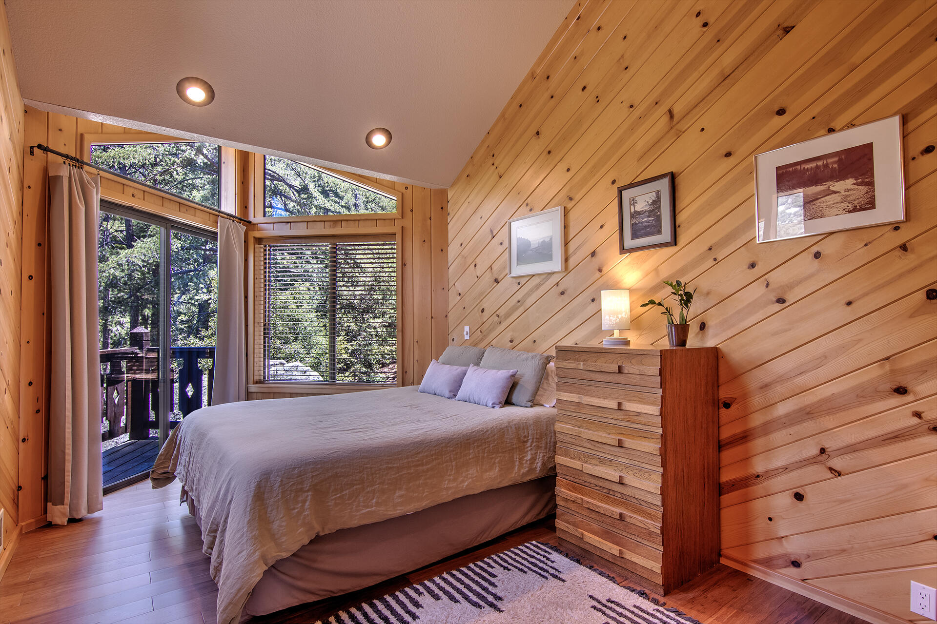 55540 Howland Road Idyllwild, CA 92549 - Photo 22 of 76 a bedroom with a bed and a large window