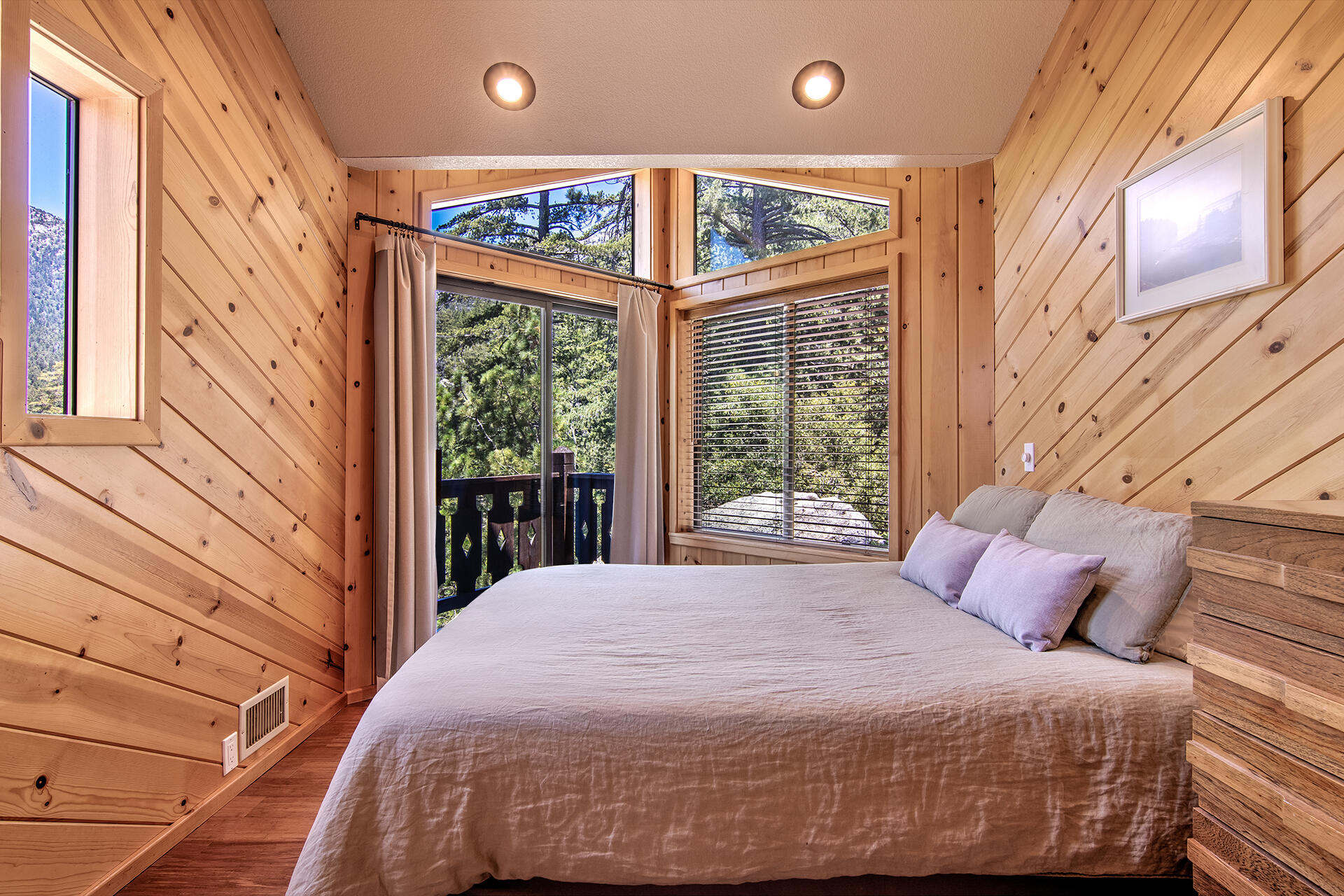 55540 Howland Road Idyllwild, CA 92549 - Photo 23 of 76 a bedroom with a large bed and a window