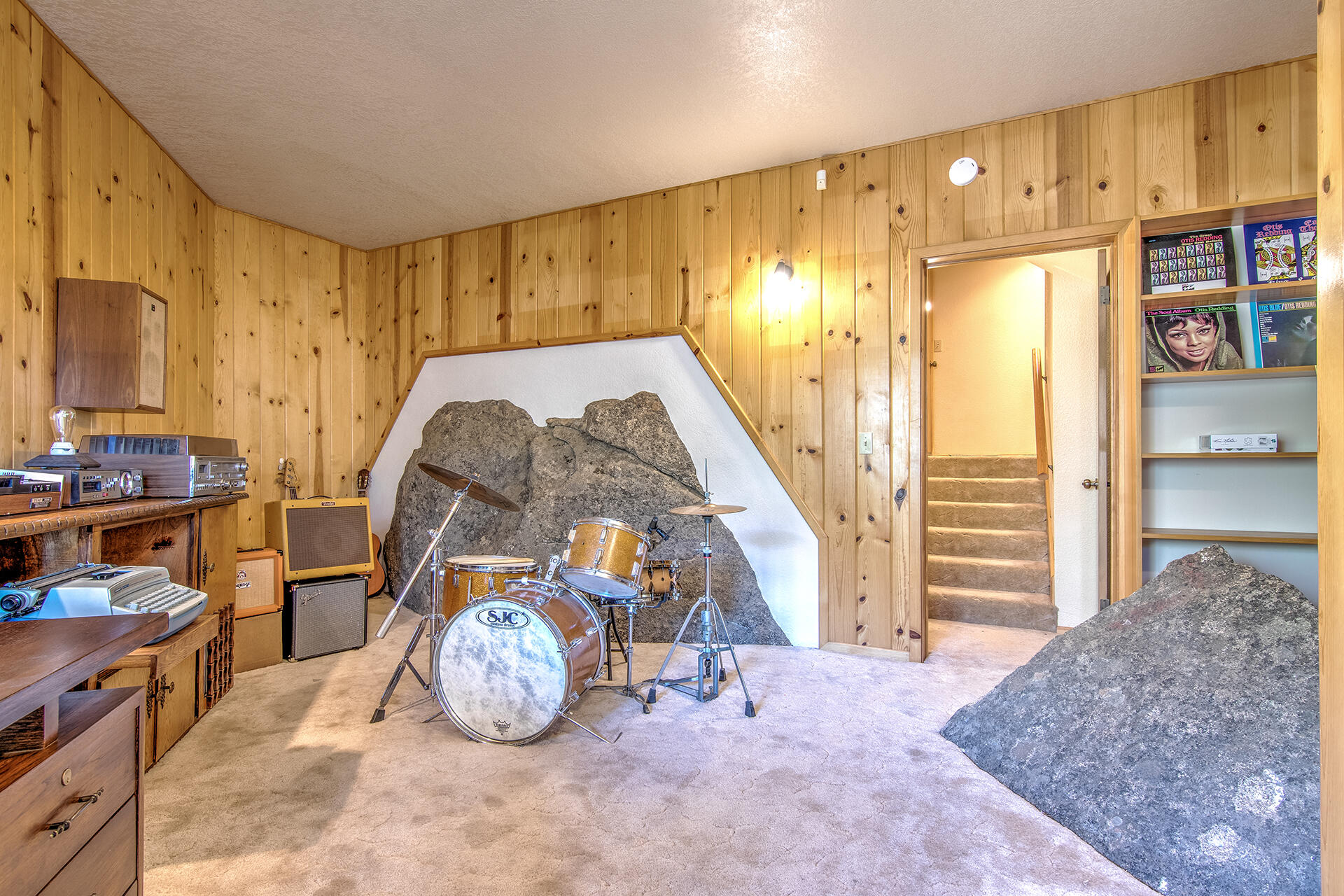 55540 Howland Road Idyllwild, CA 92549 - Photo 37 of 76 a bedroom with a bed and a dresser in it