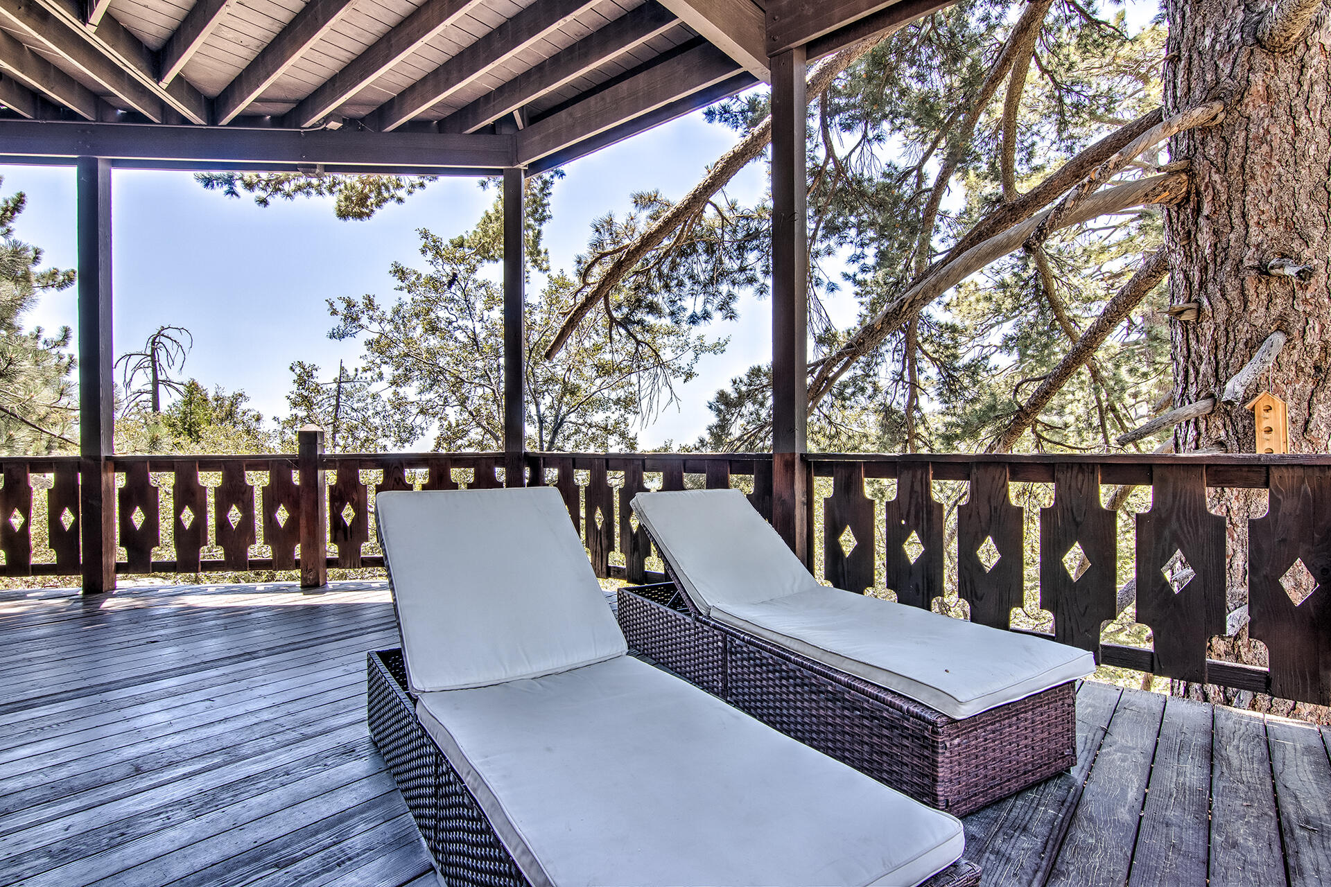 55540 Howland Road Idyllwild, CA 92549 - Photo 39 of 76 a view of wooden deck with a bench
