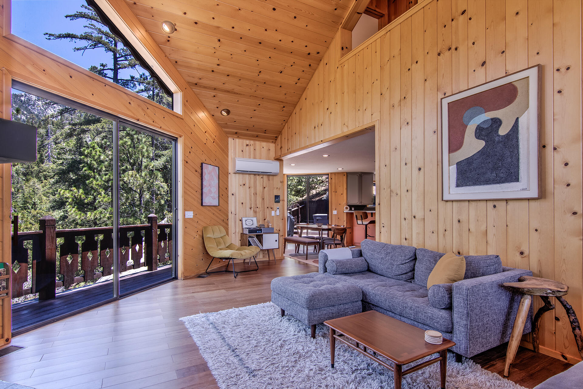 55540 Howland Road Idyllwild, CA 92549 - Photo 7 of 76 a living room with furniture and a large window